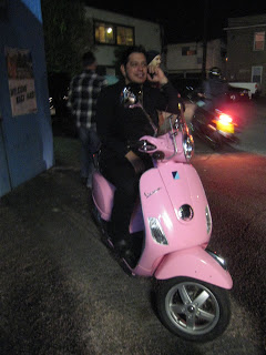 Roads traded in his Triumph for a pink Vespa….