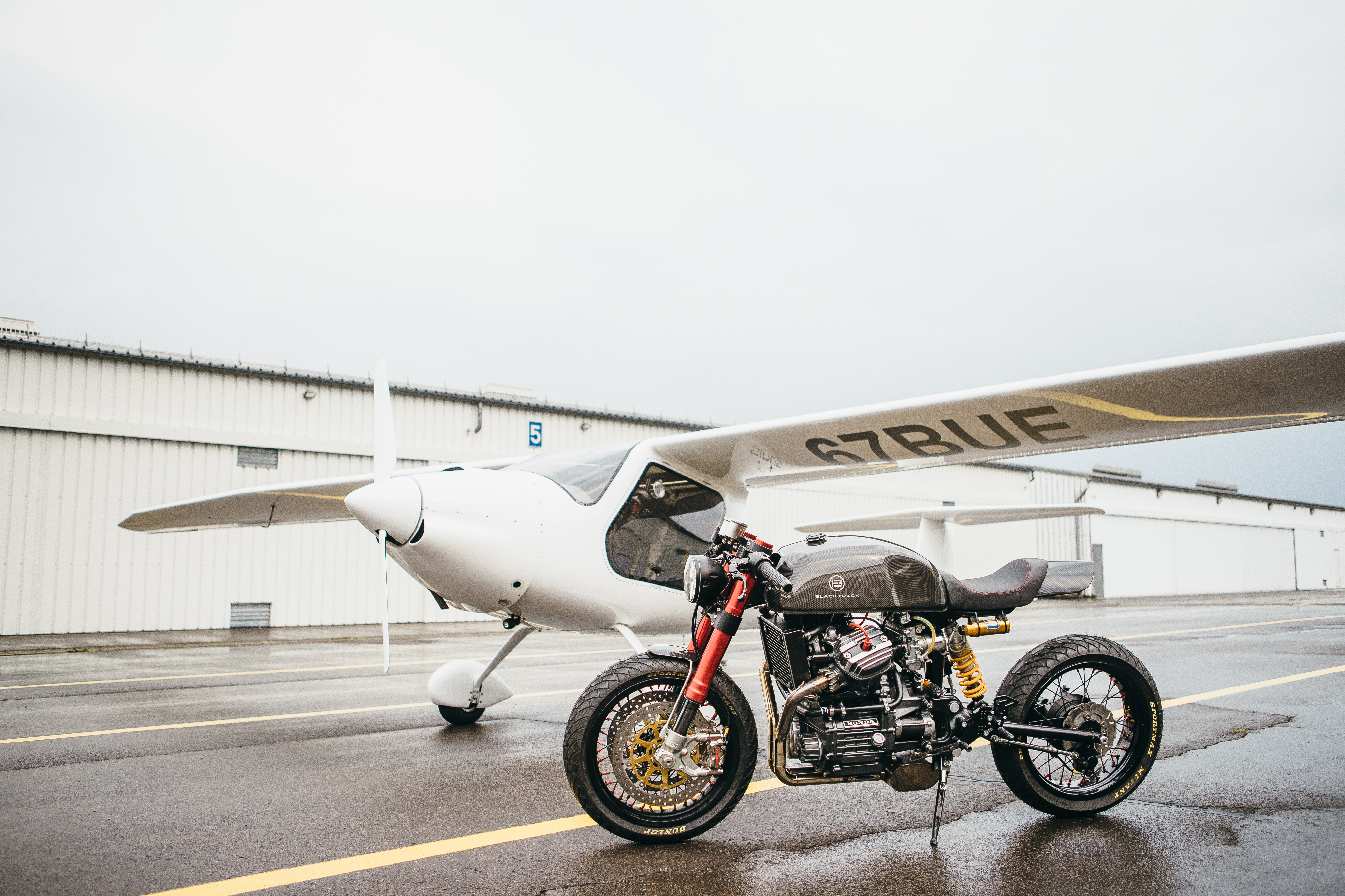 Blacktrack Motors CX500 cafe racer with plane