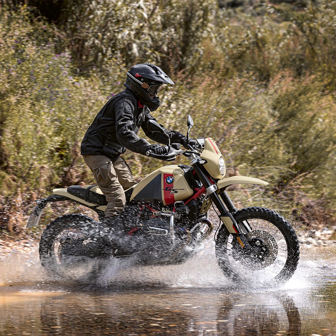 Rider navigating a creek crossing on the BMW R 12 G/S